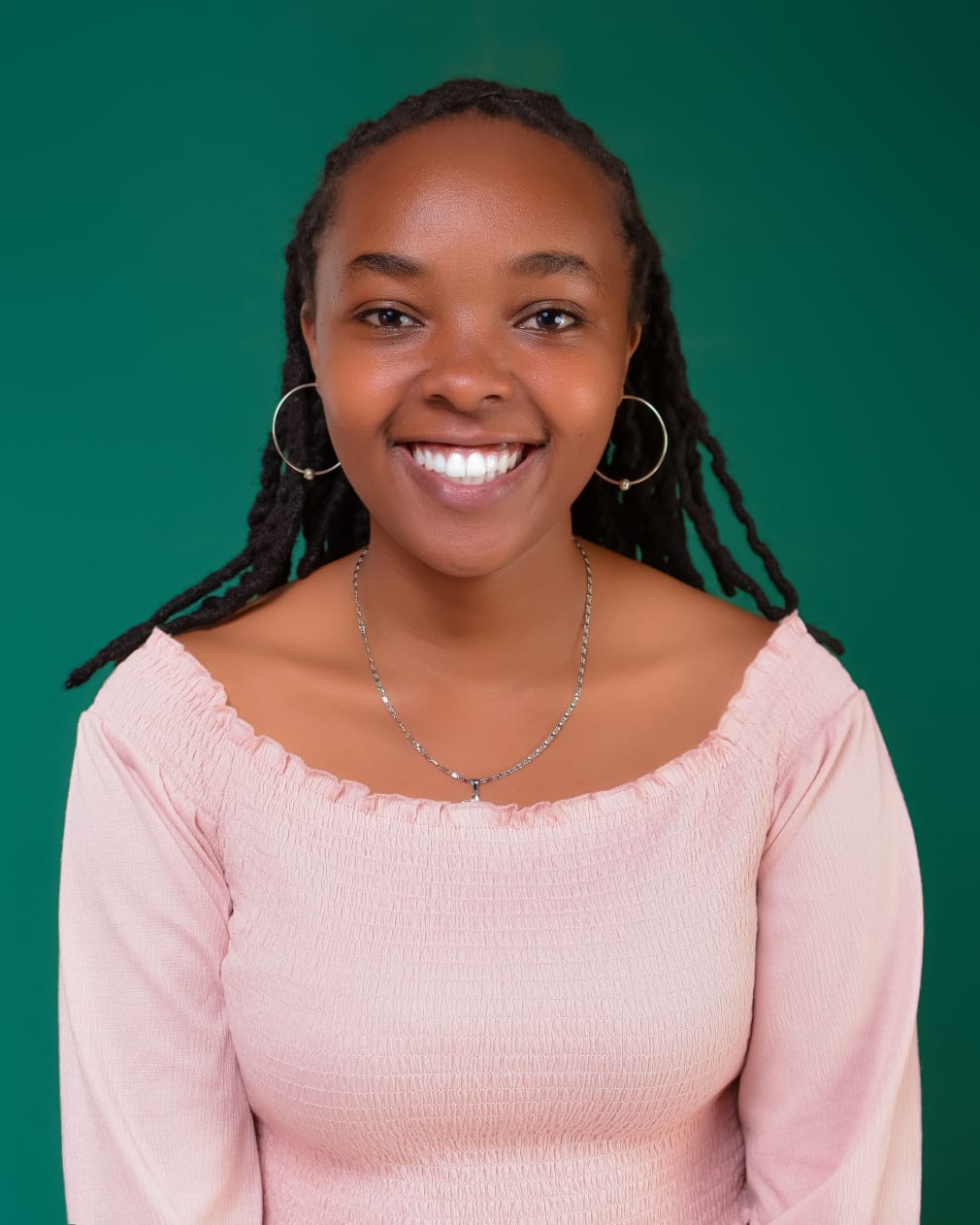 Winrose, SEO specialist and founder of Winrose World, professional headshot